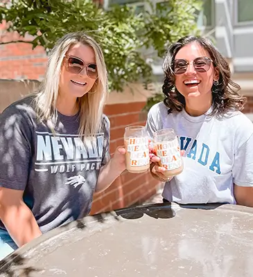 two young women enjoying coffee